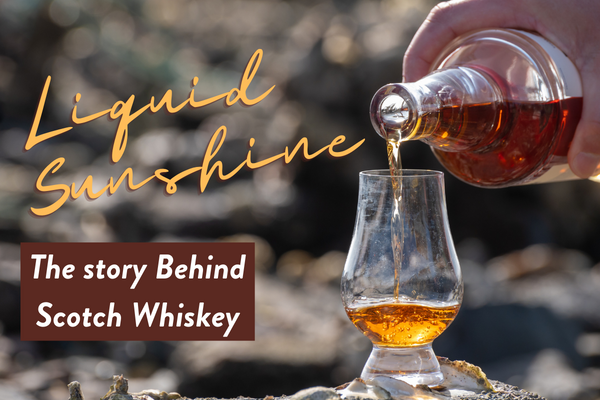 Liquid Sunshine, The Story Behind Scotch Whiskey, golden colored liquid being poured into small glass on rock